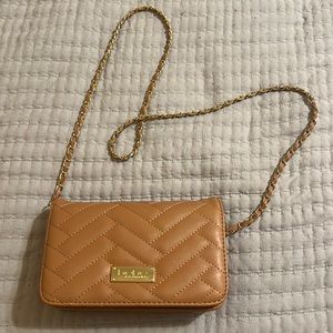 Brown faux leather purse, used
